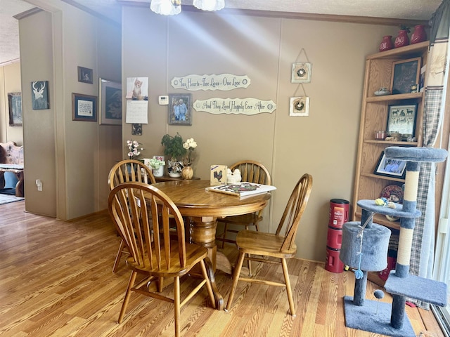 dining room with light wood-style flooring
