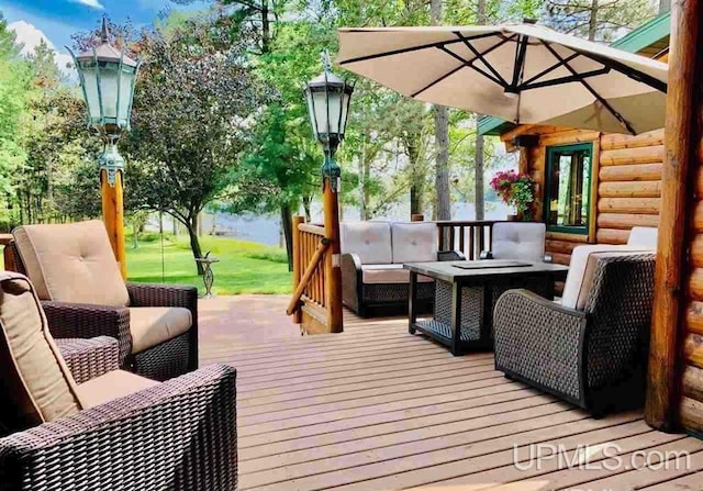 382 S Shore Dr, Crystal Falls, MI 49920 - deck featuring an outdoor hangout area
