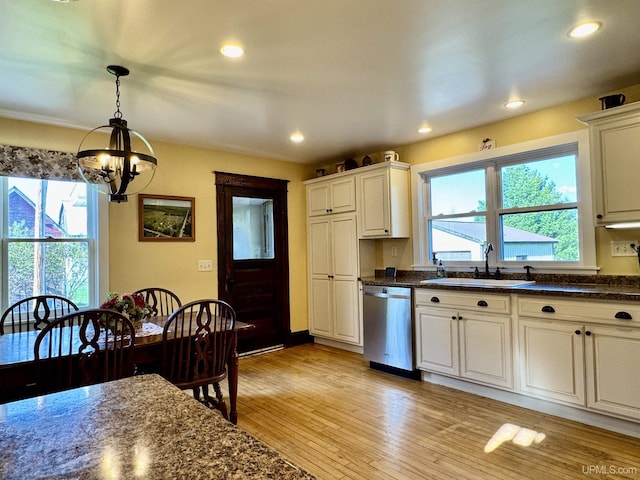 18020 Lake Rd, Pelkie, MI 49958 - kitchen featuring a sink, dishwasher, a chandelier, hanging light fixtures, and light wood-style flooring
