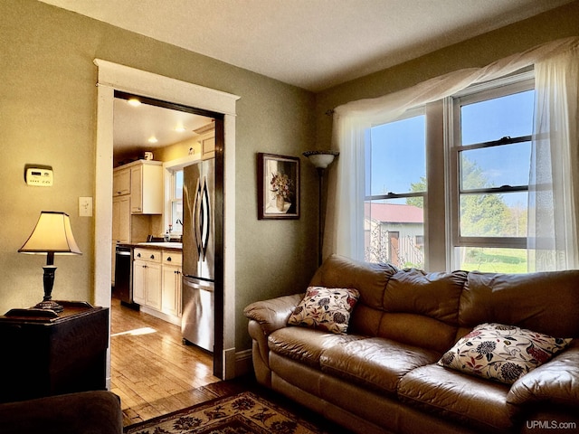 18020 Lake Rd, Pelkie, MI 49958 - living room featuring hardwood / wood-style floors