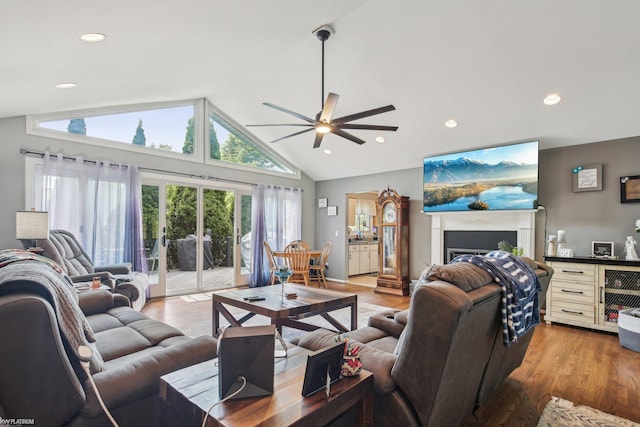 11770 Lennry Rd, Shelby Twp, MI 48315 - living area with a ceiling fan, lofted ceiling, recessed lighting, wood finished floors, and a fireplace