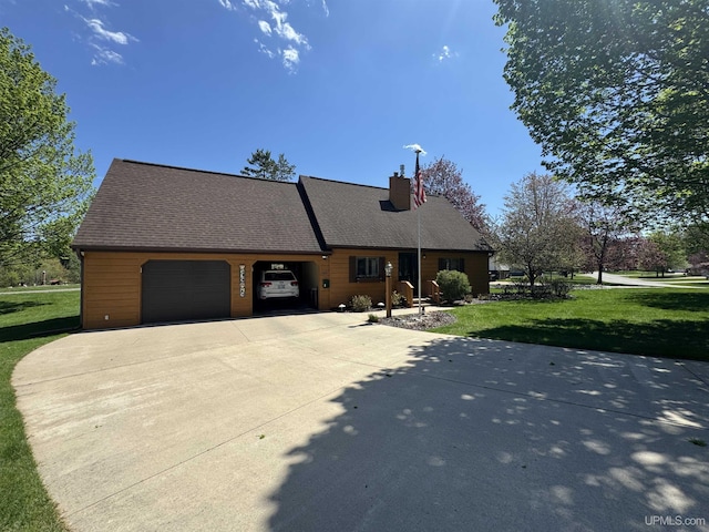 102 Forest Dr, Norway, MI 49870 - view of front of house with a front lawn, a garage, a chimney, and driveway