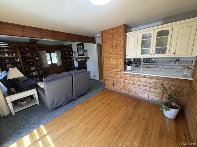 102 Forest Dr, Norway, MI 49870 - living area featuring light wood finished floors and a fireplace
