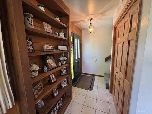 102 Forest Dr, Norway, MI 49870 - foyer featuring light tile patterned flooring and baseboards