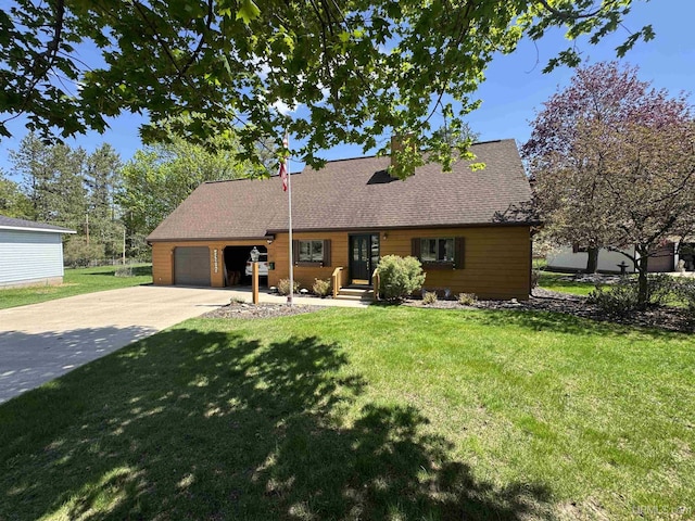 102 Forest Dr, Norway, MI 49870 - view of front facade with a garage, concrete driveway, a front lawn, and roof with shingles