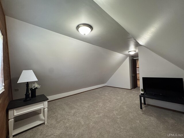 102 Forest Dr, Norway, MI 49870 - additional living space featuring carpet and lofted ceiling