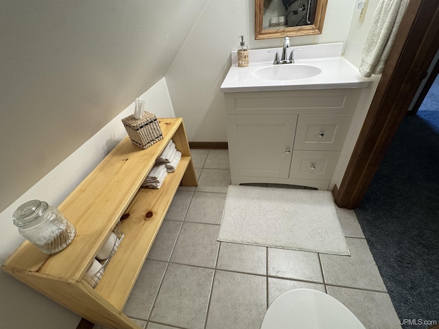 102 Forest Dr, Norway, MI 49870 - bathroom with vanity, tile patterned floors, and baseboards