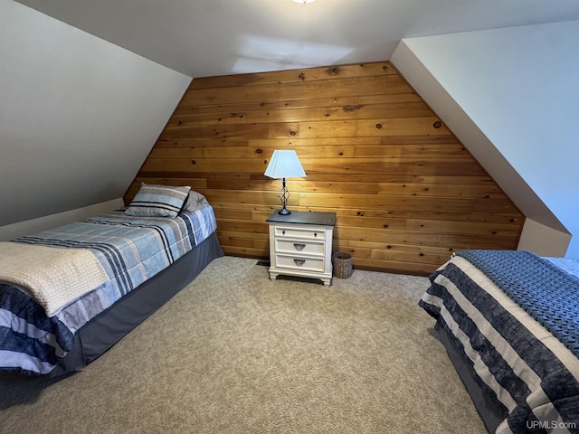 102 Forest Dr, Norway, MI 49870 - bedroom featuring wooden walls, carpet floors, and vaulted ceiling