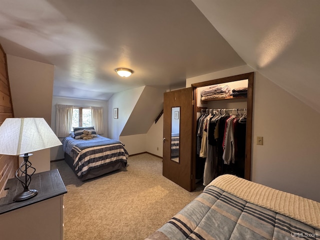 102 Forest Dr, Norway, MI 49870 - bedroom featuring light carpet, a closet, and vaulted ceiling