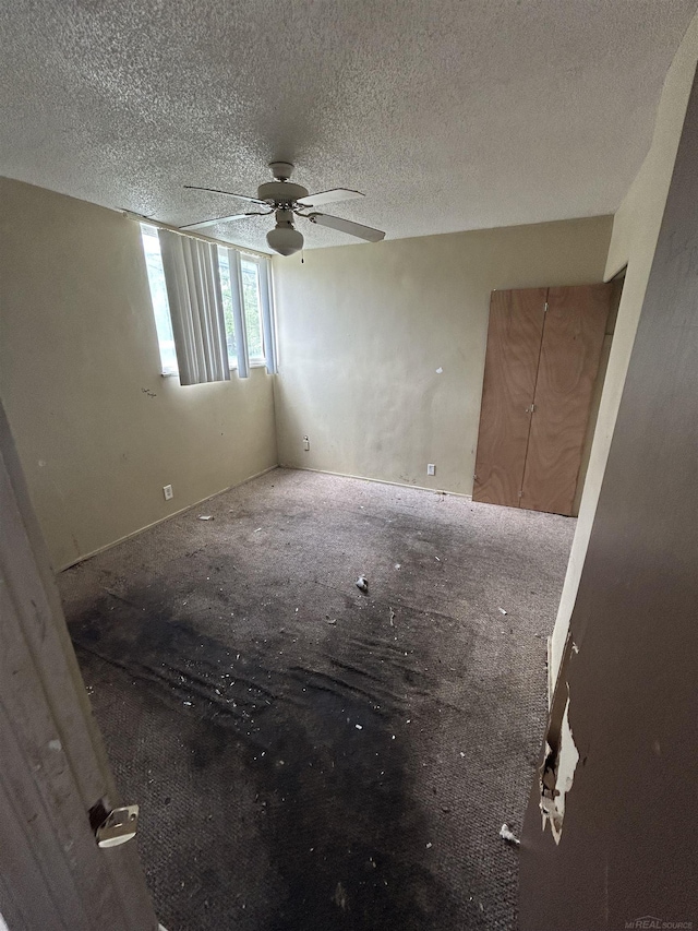 16501-16561 Greenfield Rd, Detroit, MI 48235 - empty room featuring a ceiling fan and a textured ceiling