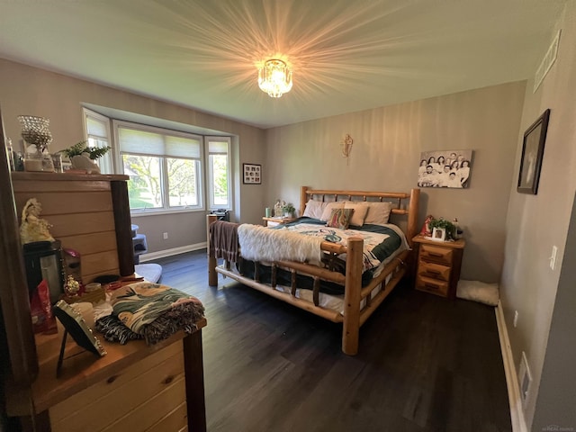 53641 Buckingham Ln, Shelby Twp, MI 48316 - bedroom featuring dark wood-style flooring and baseboards