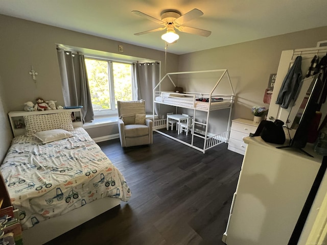 53641 Buckingham Ln, Shelby Twp, MI 48316 - bedroom with dark wood finished floors, ceiling fan, and baseboards