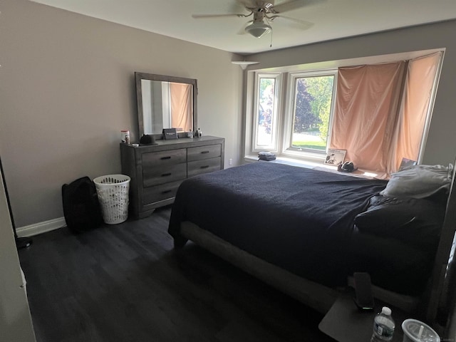 53641 Buckingham Ln, Shelby Twp, MI 48316 - bedroom with baseboards, dark wood-type flooring, and a ceiling fan