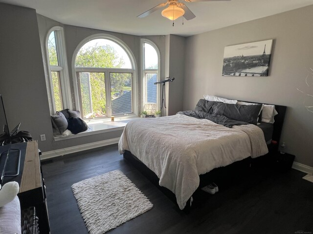 53641 Buckingham Ln, Shelby Twp, MI 48316 - bedroom with baseboards, wood finished floors, and a ceiling fan
