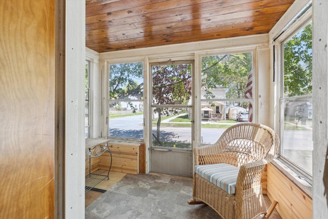 402 E Fisher St, Bay City, MI 48706 - sunroom / solarium with plenty of natural light, wooden ceiling, and stone finish floors