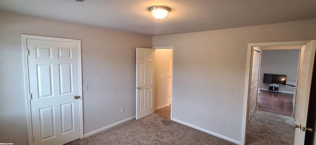 38770 Lanse Creuse St, Harrison Twp, MI 48045 - unfurnished bedroom featuring carpet flooring and baseboards