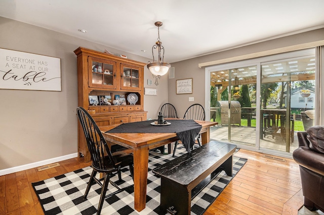38186 Jefferson Ave, Harrison Twp, MI 48045 - dining room featuring light wood-style floors, baseboards, and recessed lighting