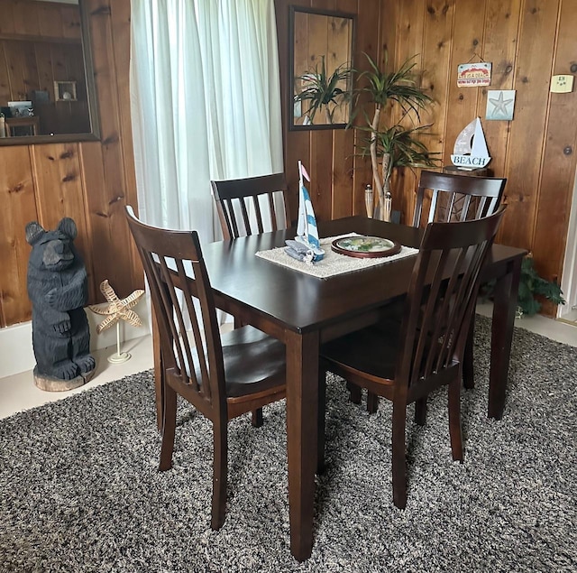 4550 Calhoun Rd, Beaverton, MI 48612 - dining area featuring wood walls
