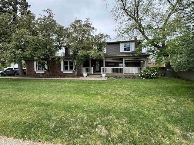 4283 Snoal Ln, Shelby Twp, MI 48316 - view of front of house featuring covered porch and a front lawn