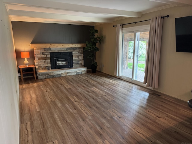 4283 Snoal Ln, Shelby Twp, MI 48316 - unfurnished living room featuring beam ceiling, wood finished floors, and a fireplace