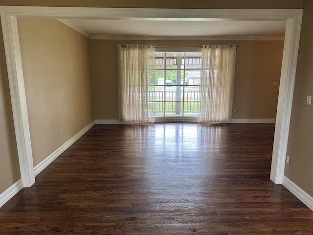 4283 Snoal Ln, Shelby Twp, MI 48316 - unfurnished room with crown molding, dark wood-style flooring, and baseboards