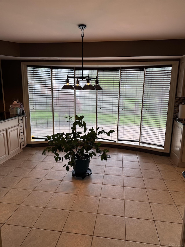 4283 Snoal Ln, Shelby Twp, MI 48316 - dining space with light tile patterned flooring