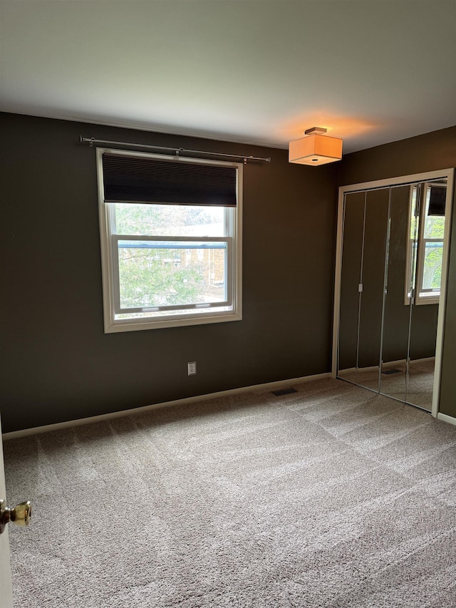 4283 Snoal Ln, Shelby Twp, MI 48316 - unfurnished bedroom with carpet, a closet, and baseboards