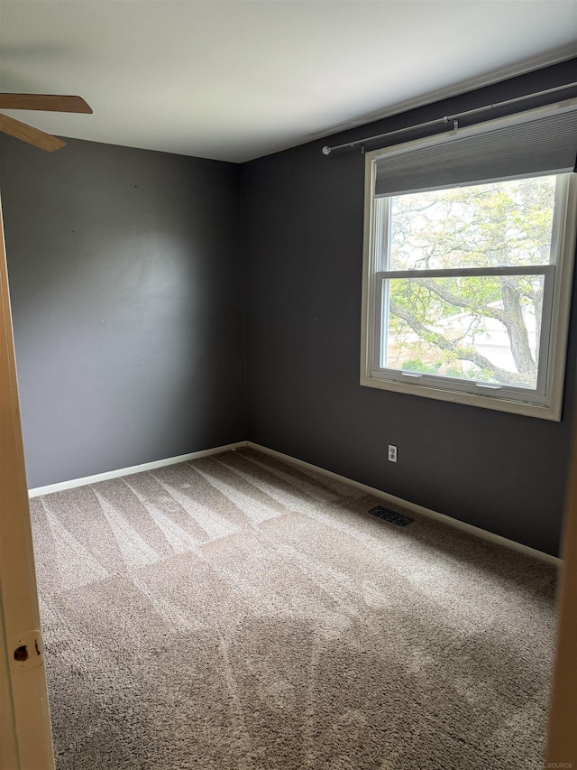 4283 Snoal Ln, Shelby Twp, MI 48316 - carpeted empty room with ceiling fan and baseboards