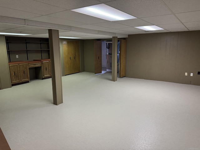 4283 Snoal Ln, Shelby Twp, MI 48316 - finished below grade area featuring a paneled ceiling, an office area, and wood walls