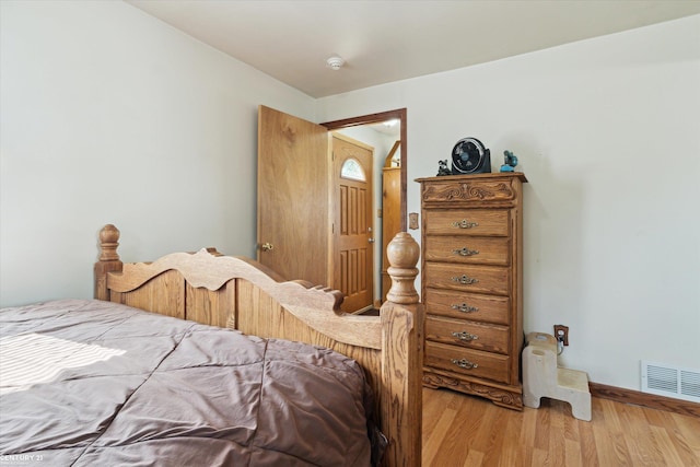 1497 Parke St, Rochester Hills, MI 48307 - bedroom featuring wood finished floors and baseboards