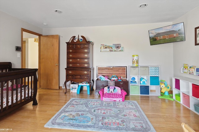 1497 Parke St, Rochester Hills, MI 48307 - bedroom featuring wood finished floors