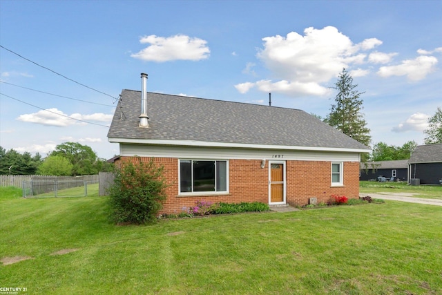 1497 Parke St, Rochester Hills, MI 48307 - rear view of property with brick siding and a shingled roof