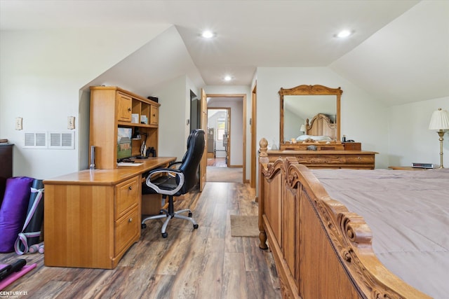 1497 Parke St, Rochester Hills, MI 48307 - office space featuring dark wood-type flooring, recessed lighting, and vaulted ceiling