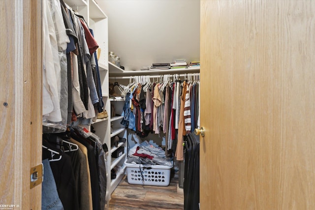 1497 Parke St, Rochester Hills, MI 48307 - walk in closet featuring wood finished floors
