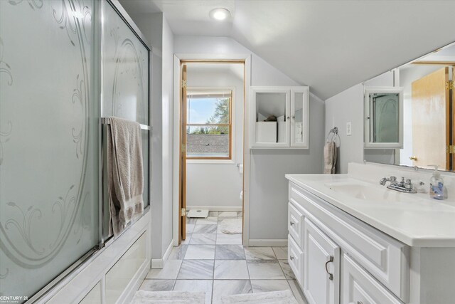 1497 Parke St, Rochester Hills, MI 48307 - full bath with lofted ceiling, baseboards, marble look tiles, and vanity