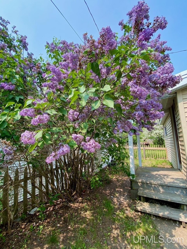 213 N Fifth St, Marquette, MI 49855 - view of yard featuring a wooden deck