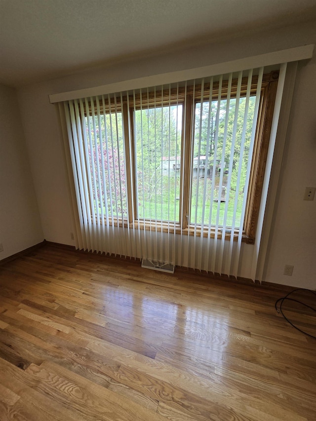41 W River Dr, Gladwin, MI 48624 - unfurnished room with wood finished floors