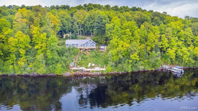 106 Green Rd, Michigamme, MI 49861 - water view with a heavily wooded area and stairs