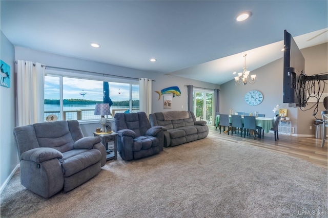 106 Green Rd, Michigamme, MI 49861 - living area with a chandelier, a water view, lofted ceiling, recessed lighting, and baseboards