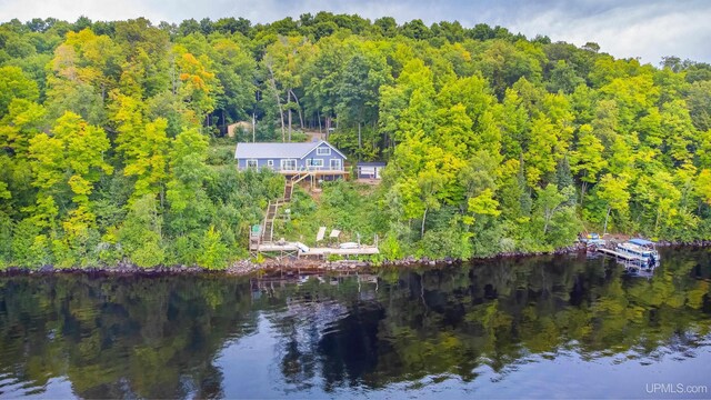 106 Green Rd, Michigamme, MI 49861 - water view featuring a heavily wooded area and stairway