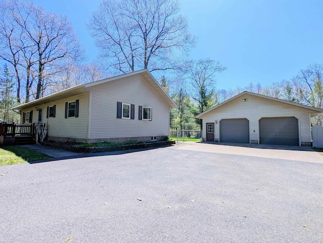 14 Arrowhead Dr, Marquette, MI 49855 - view of side of property featuring a garage and an outdoor structure
