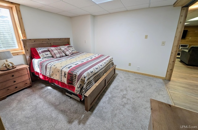 14 Arrowhead Dr, Marquette, MI 49855 - carpeted bedroom with a drop ceiling and baseboards