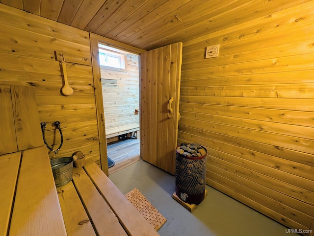 14 Arrowhead Dr, Marquette, MI 49855 - sauna with wooden walls, concrete floors, and wood ceiling