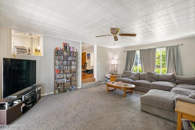 1131 Boyd St, Troy, MI 48083 - living area with a ceiling fan, carpet flooring, and baseboards
