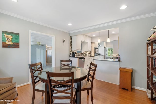 1131 Boyd St, Troy, MI 48083 - dining room featuring light wood-style floors, a ceiling fan, crown molding, recessed lighting, and baseboards