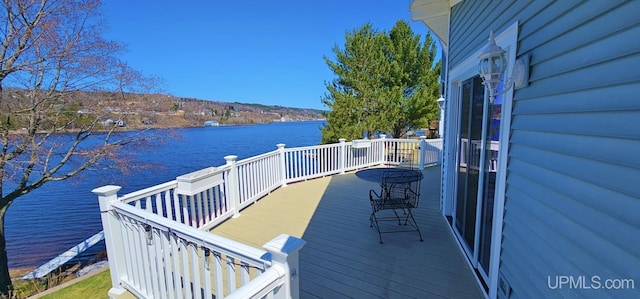 18918 Canal Rd, Houghton, MI 49931 - wooden deck featuring a water view