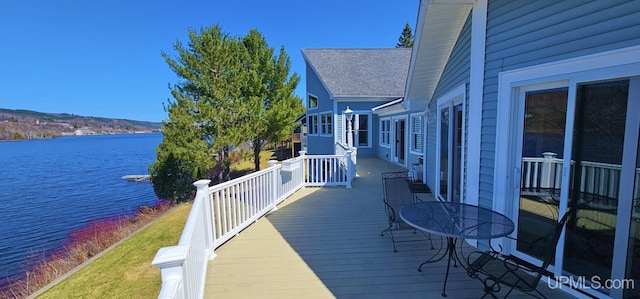 18918 Canal Rd, Houghton, MI 49931 - wooden deck featuring a water view