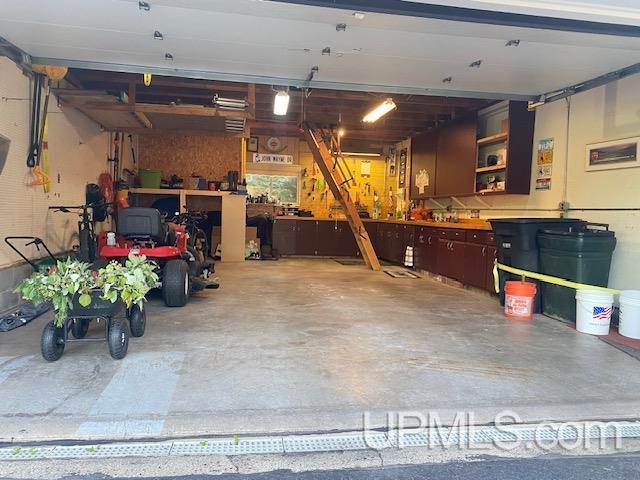 18918 Canal Rd, Houghton, MI 49931 - garage featuring a workshop area