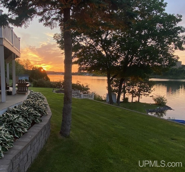 18918 Canal Rd, Houghton, MI 49931 - view of green lawn featuring a water view and a balcony