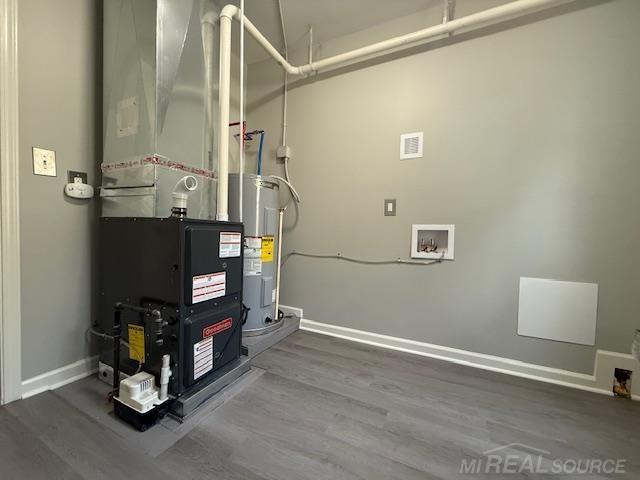 1416 Kearney St, Port Huron, MI 48060 - utility room with water heater